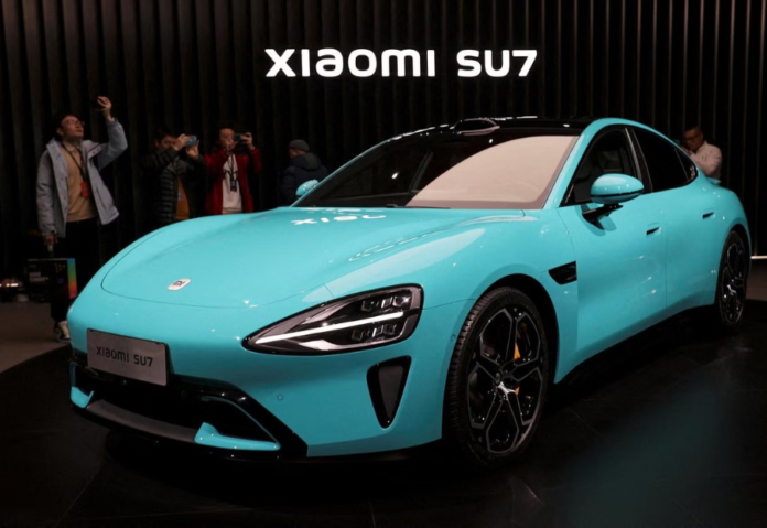 China's Xiaomi set to begin shipments of its first EV model, shares rocket