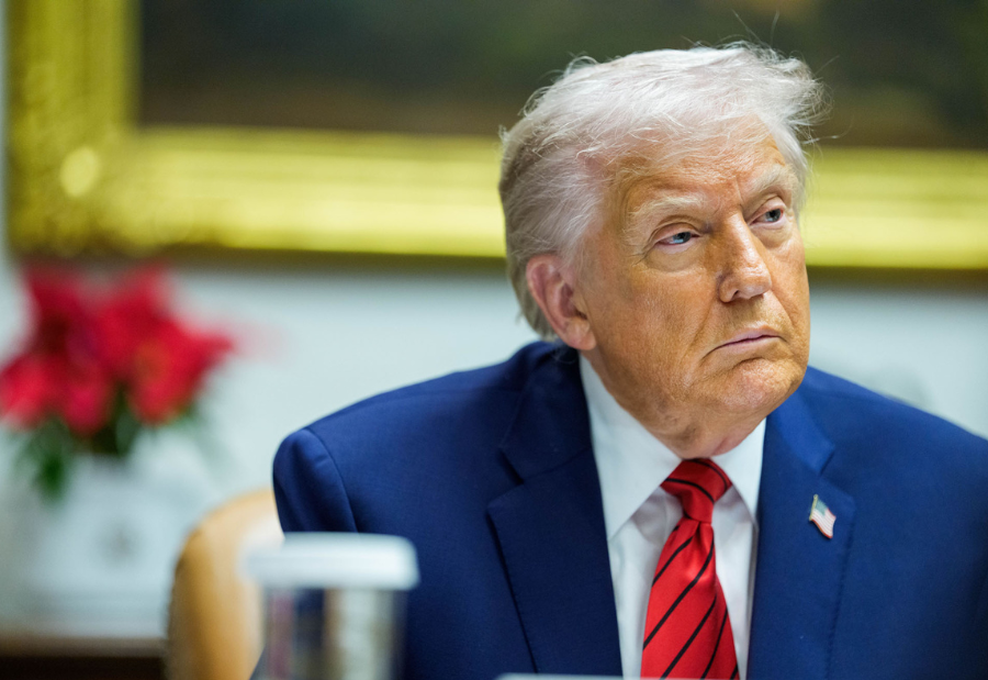 Trump order seeks to override state AI laws, igniting federal–state power struggle