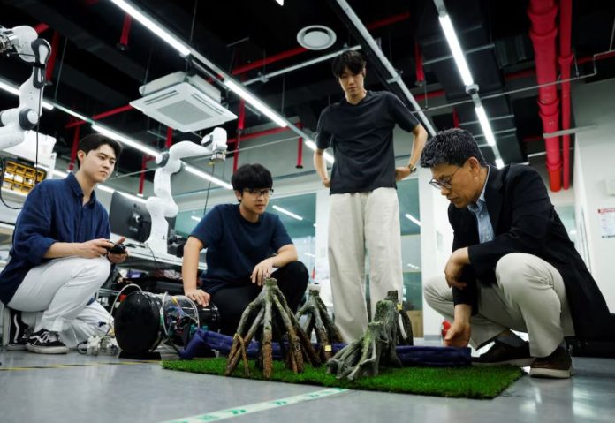 KAIST and Stanford researchers create self-dressing robotic clothing for hands-free use. Photo credit: REUTERS