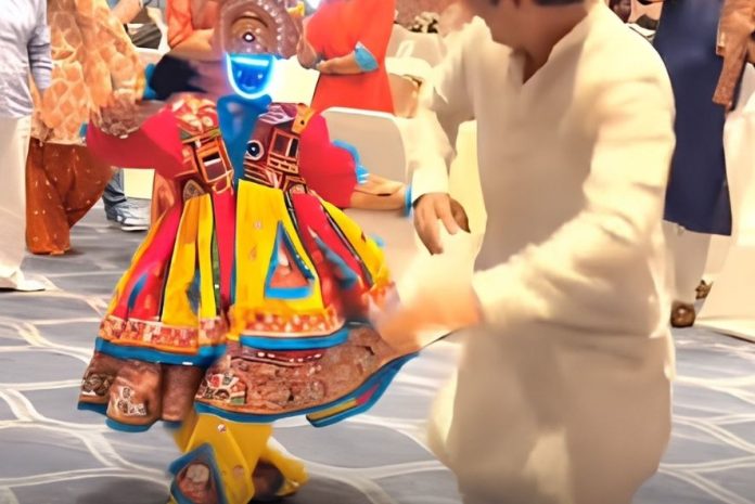 Mumbai garba coach’s dance with a robot blends festive tradition with technology Mumbai garba coach’s dance with a robot blends festive tradition with technology
